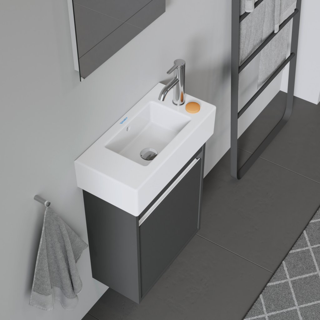 Vero vägghängt tvättställ från Duravit med en blandare på höger sida i ett badrum.