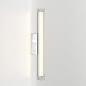 io 665 vägglampa i glas i en cyliderform.