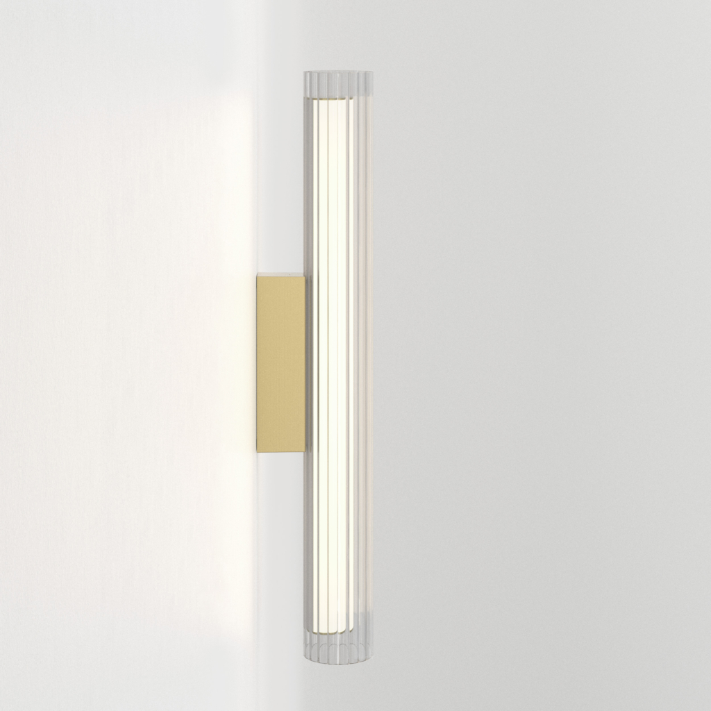 io 665 vägglampa i glas i en cyliderform.