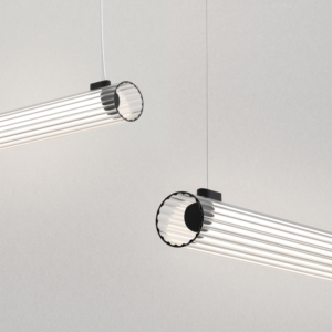 io Pendant 1000 taklampa, är en cylinderformad lampa som hänger från taket i två stållinor.
