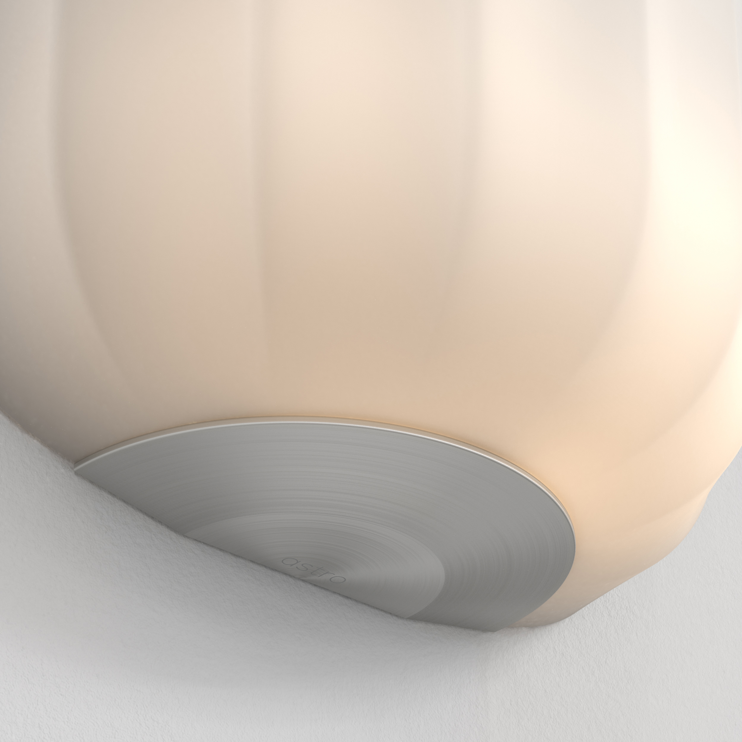 Närbild på en Veo vägglampa.