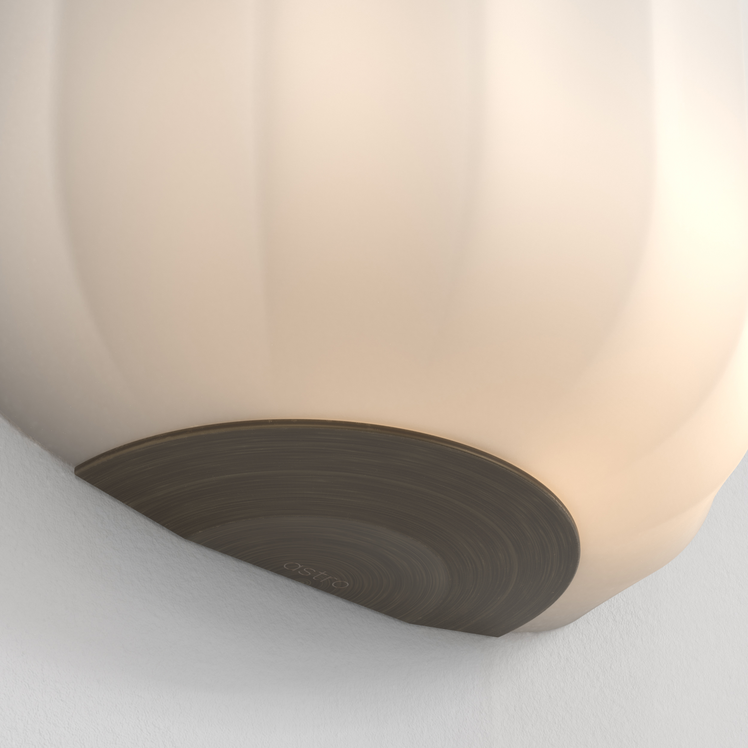Närbild på en Veo vägglampa.