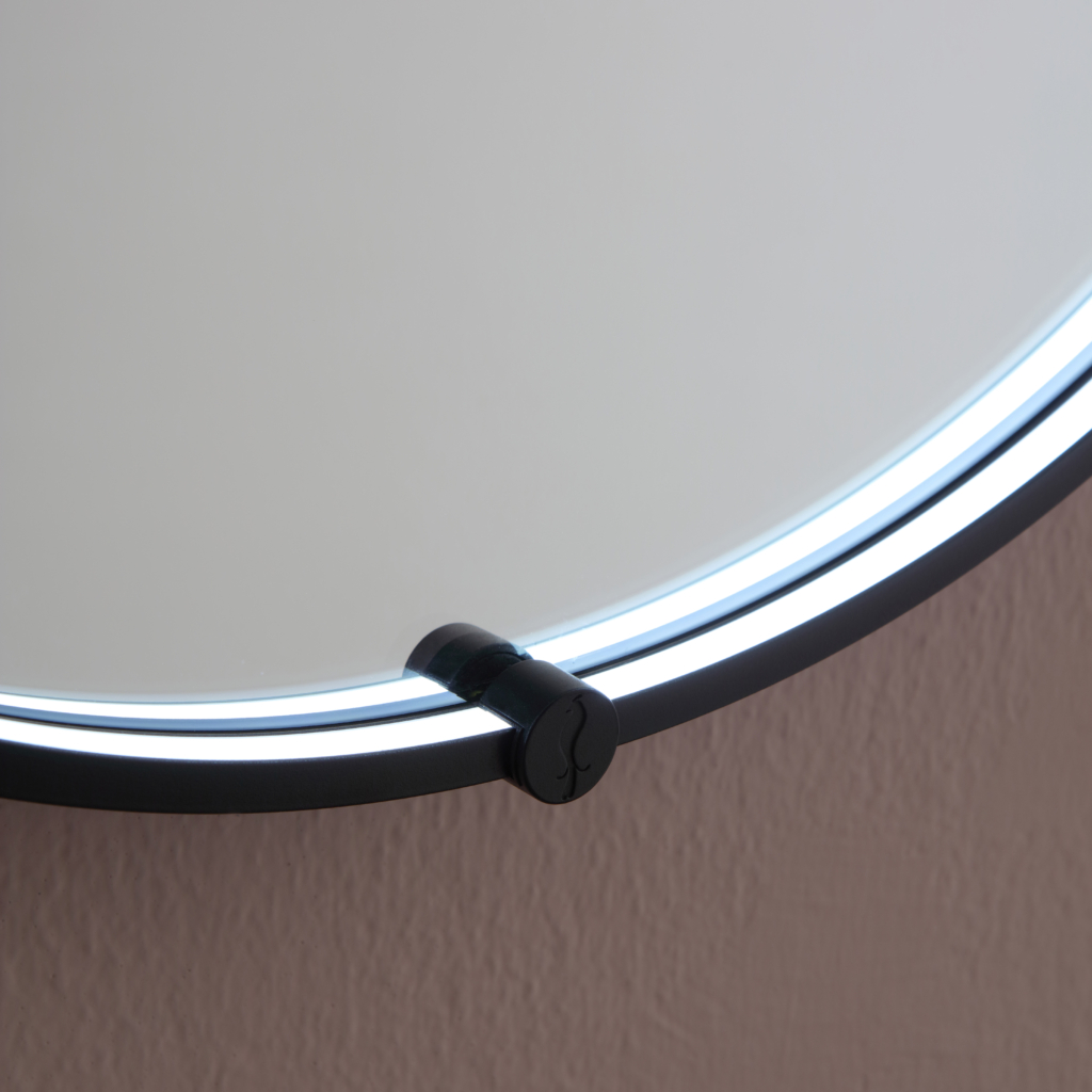 Frame rund spegel med belysning.
