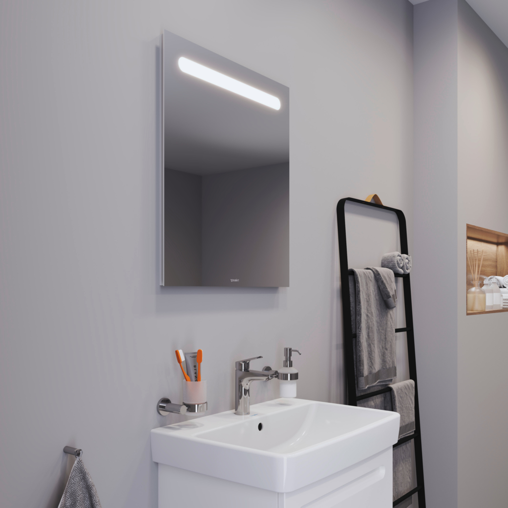 Kommod, högskåp och spegelskåp med belysning i ovankant från serien No.1 från Duravit i färgen vit. Sittandes på en vit vägg.