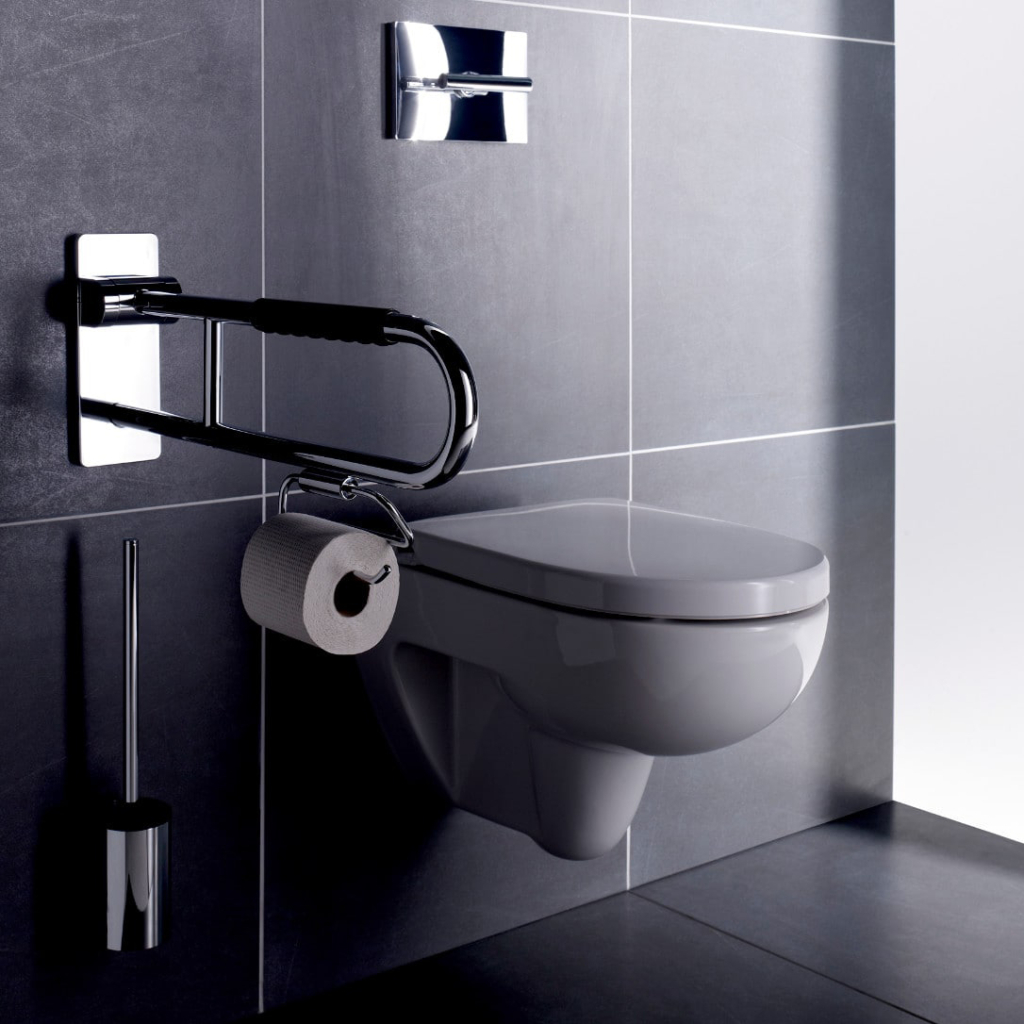 Toalettpappershållare för armstöd i ett badrum.