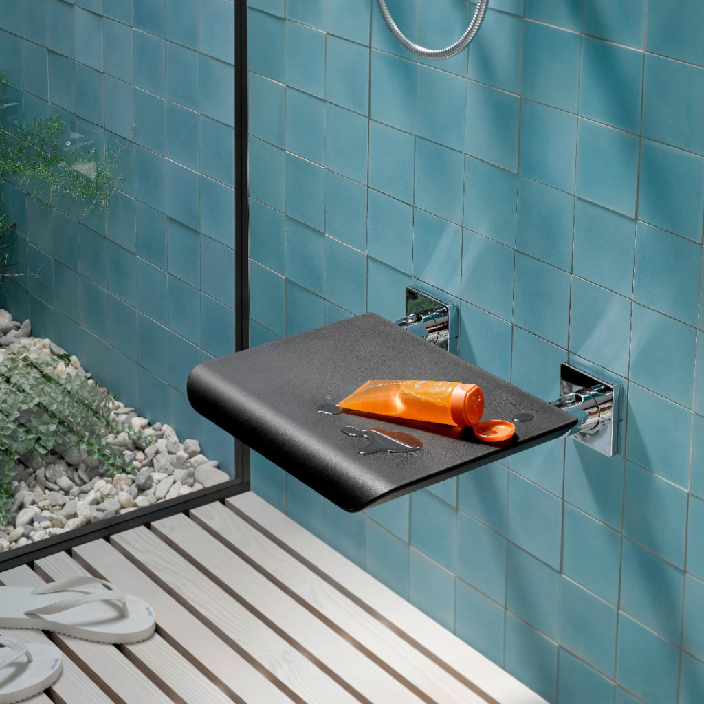 Fällbar sits för vägg