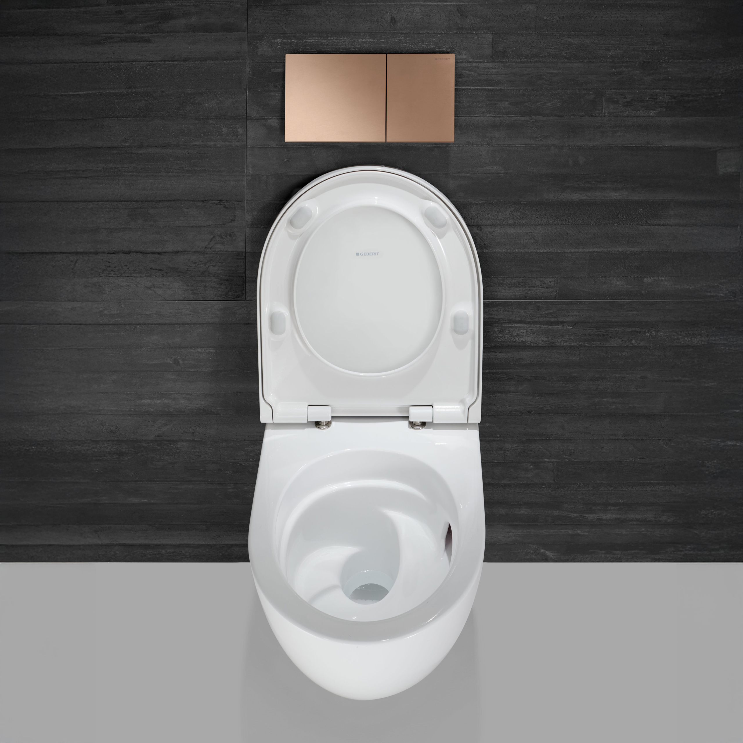 Acanto vägghängd toalettstol i ett badrum.