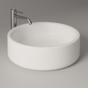 Torcello runt tvättställ för bänk med en blandare.