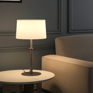 Club Table bordslampa med skärm på ett bord bredvid en fåtölj.