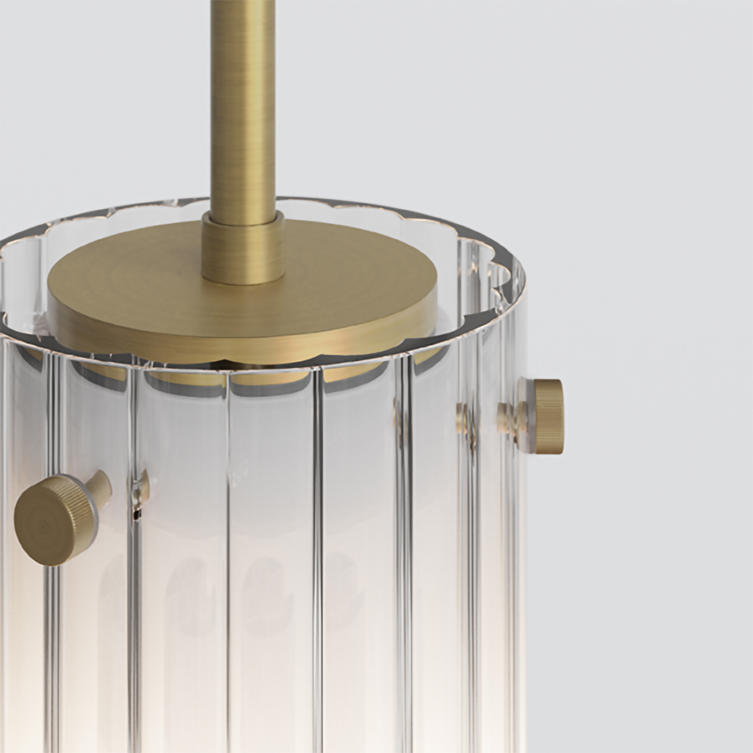 Närbild på pendlande lampa Ottavino Pendant med ett räfflat frostat glas i färgen matt borstad mässing.